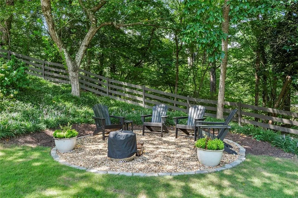 View of yard with a fire pit