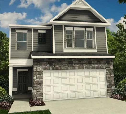 Two-story residence featuring a stone and siding exterior, an attached two-car garage, and a covered entry with a panel door