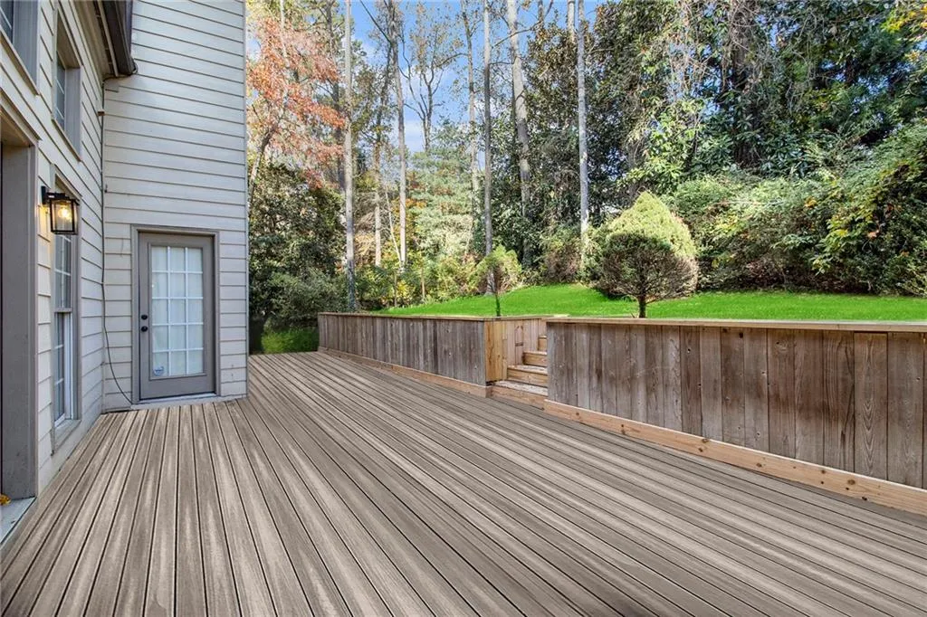 Deck featuring a yard