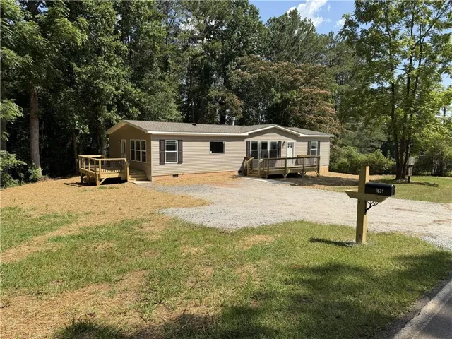 Front with parking and mailbox