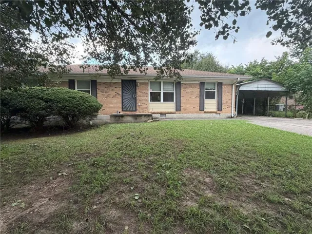 Solid ranch with carport on huge, level corner lot
