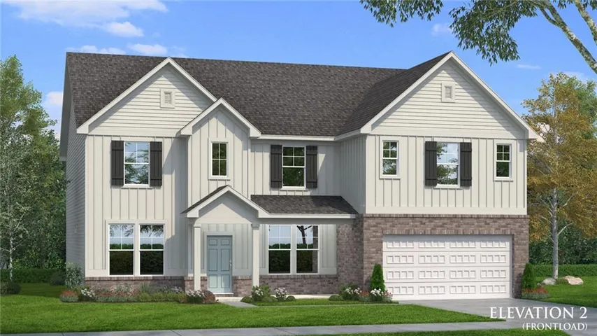 Two-story home with a light-colored board and batten facade and dark shingle roofing