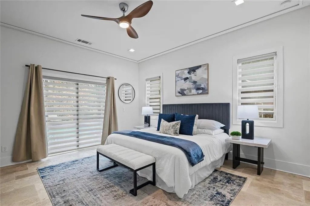 Bedroom in main with pool access.