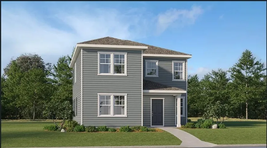 Two-story residence featuring gray horizontal siding, white trim, a dark gray entry door, a covered entry, and a paved walkway