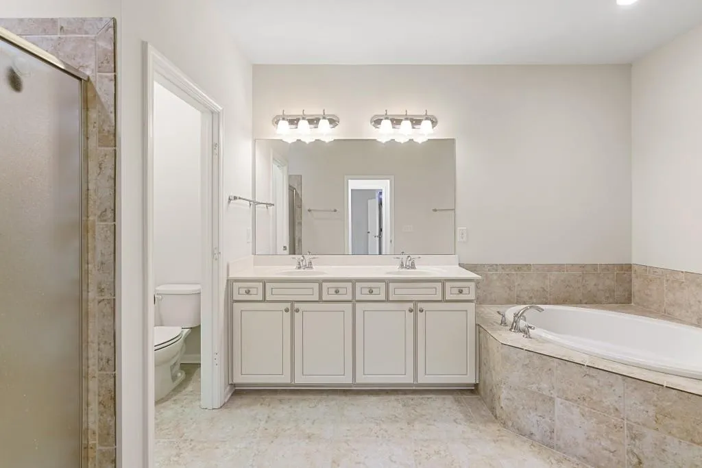 Not seen: large His and Hers Closets