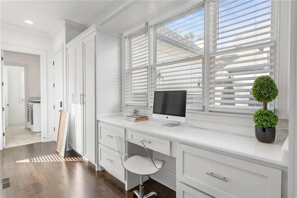 mud room with work desk space