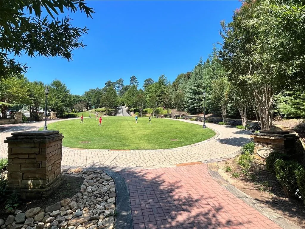 View of community with a yard