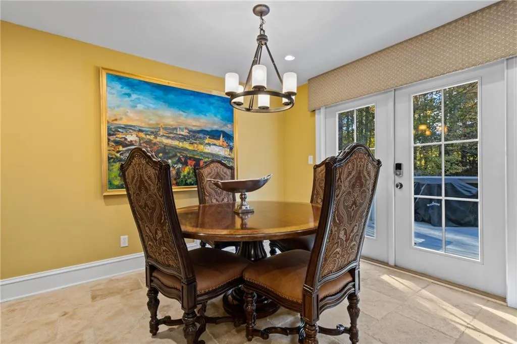 Dining room featuring a chandelier and recessed lighting