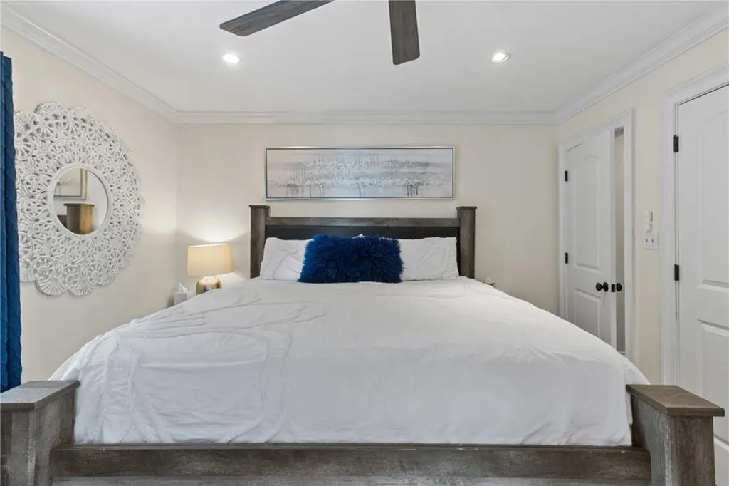 Bedroom featuring crown molding, ceiling fan, and recessed lighting