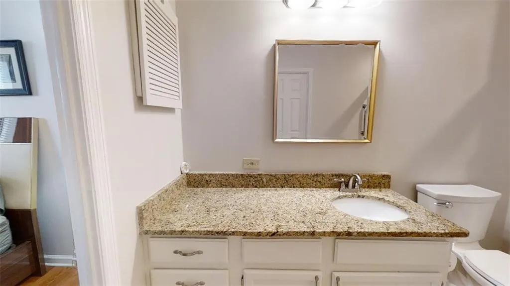 Bathroom with toilet and vanity