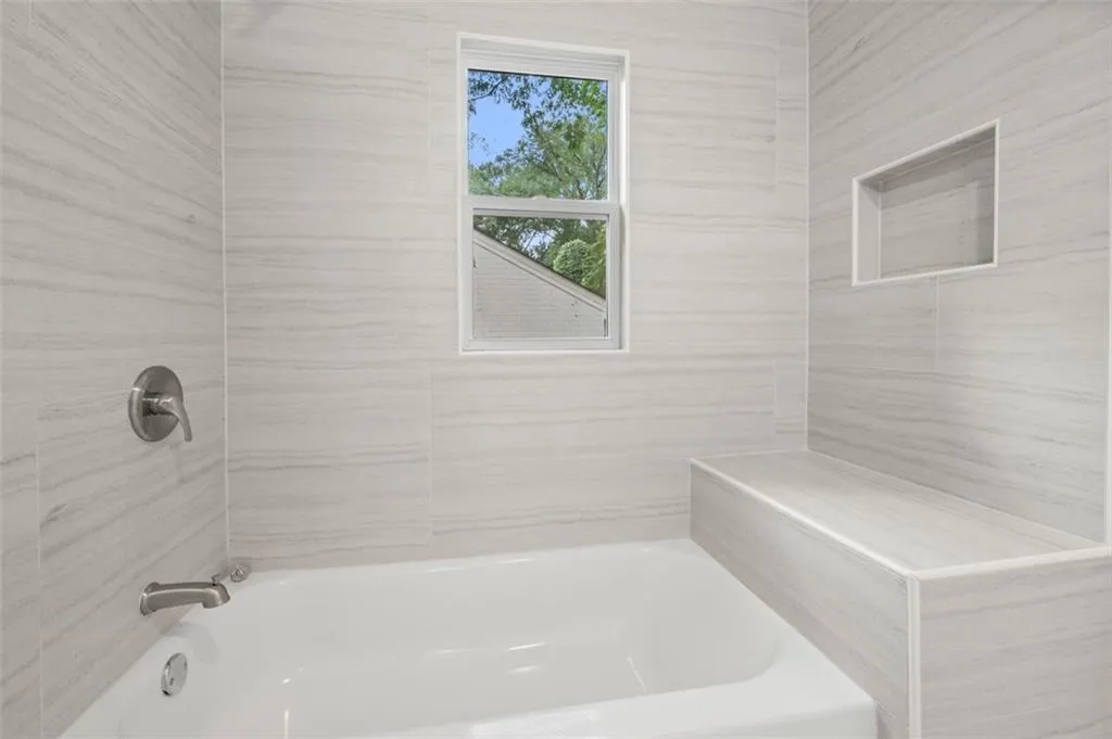 Full bathroom with shower / bathtub combination