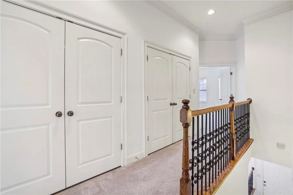 Hallway that leads to the Primary Bedroom