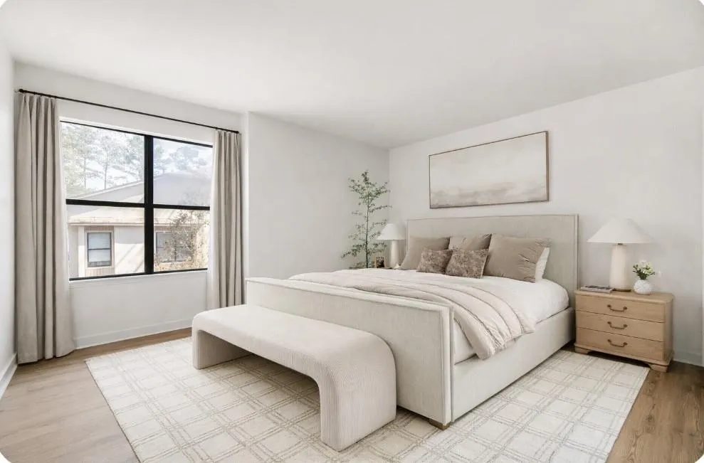 Bedroom with light wood-type flooring and baseboards