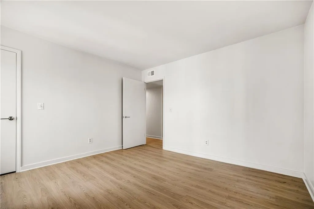 2nd Bedroom featuring light wood-type flooring and baseboards