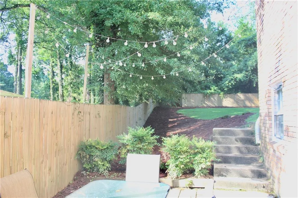 View of fenced backyard