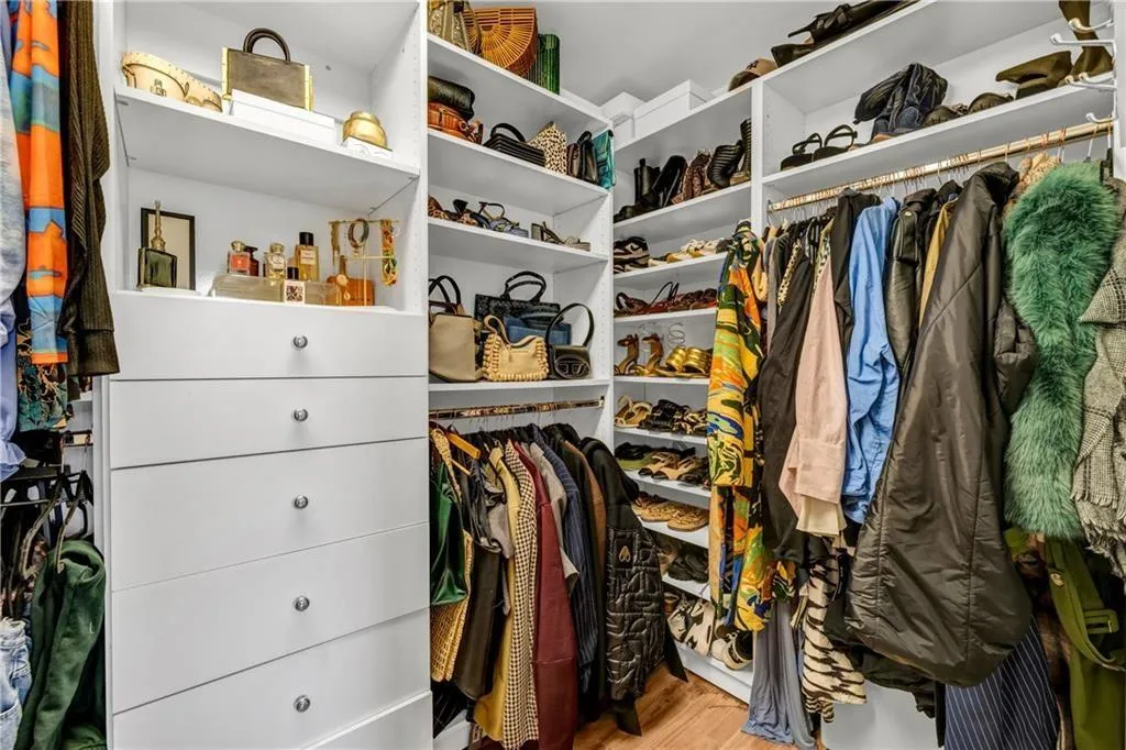 Spacious closet with wood finished floors