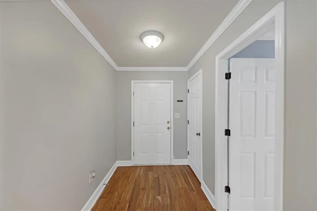 Entrance with coat closet & entry to the Owner's Suite