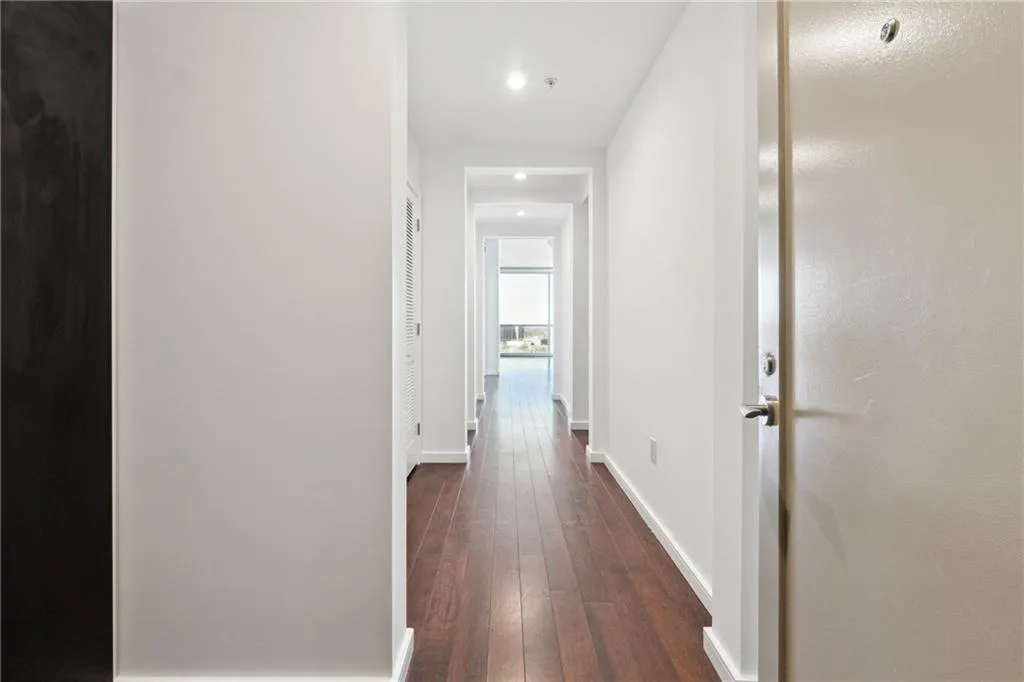 Private Foyer with Custom Closets and Coat Closet offering lots of Storage