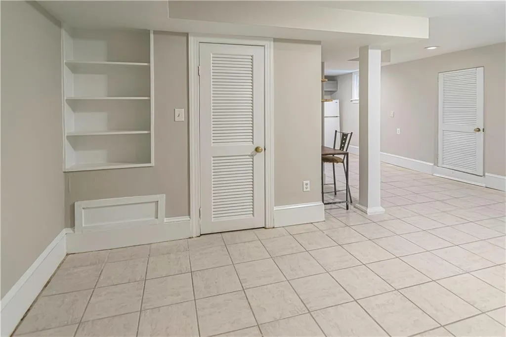 Spare room featuring light tile patterned floors and recessed lighting