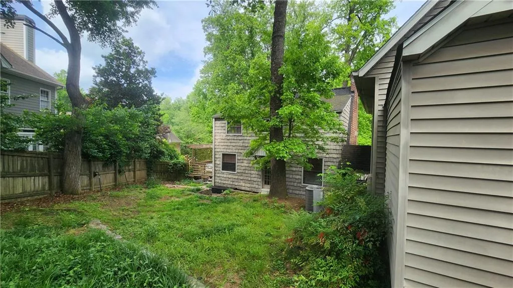 View of yard featuring cooling unit
