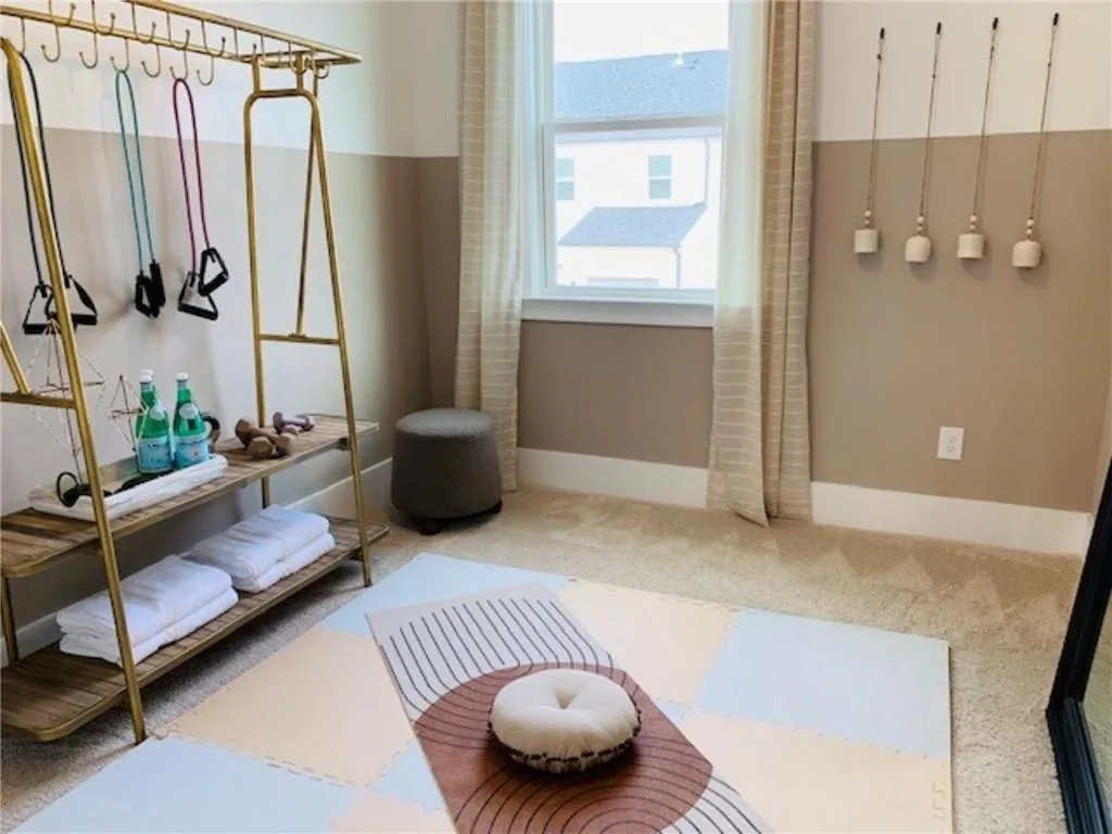 Bedroom 3 is show as an exercise space.  Model photo.  Not actual home.