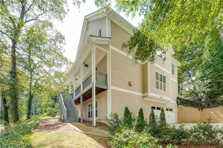 Multi-story exterior with light-colored siding