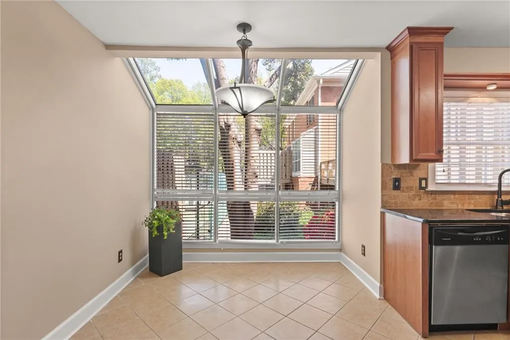 Attached to your kitchen is the tiled breakfast room, flooded with natural light from the skylight.
