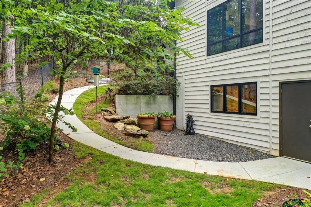 Side of the house has easy access to the terrace level.