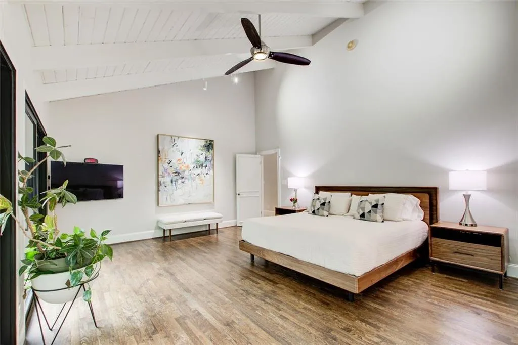 Beautiful spaces everywhere in this prprimary bedroom