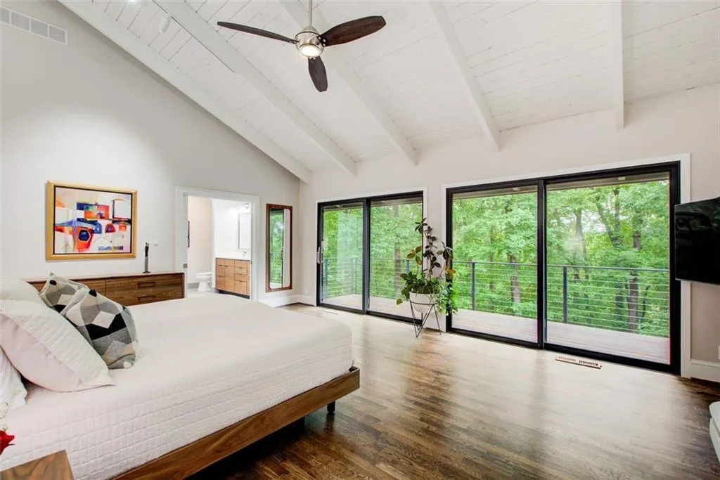 Primary bedroom is spacious, lots of beautiful light and a spa like bath