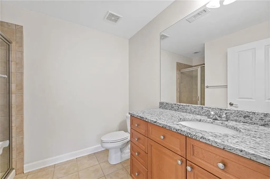 Bath attached to secondary bedroom.