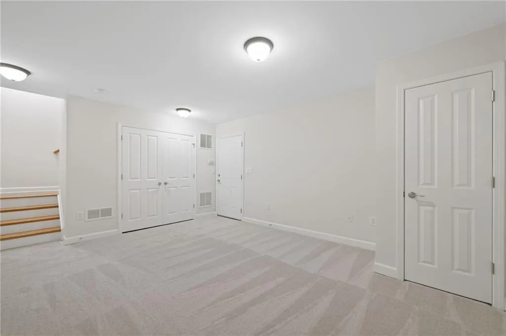 Another view of finished room on lower level.