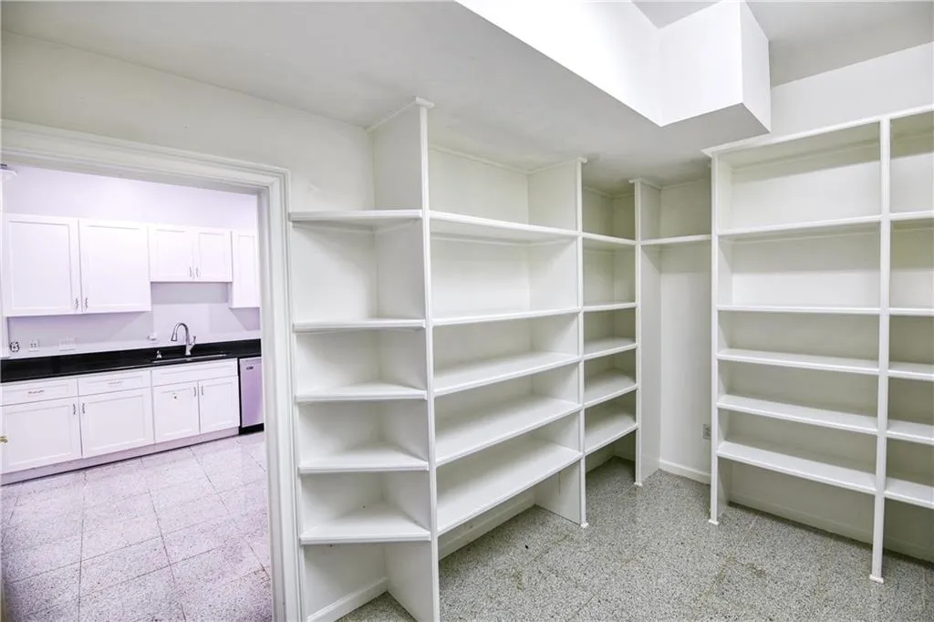 Storage area featuring a sink