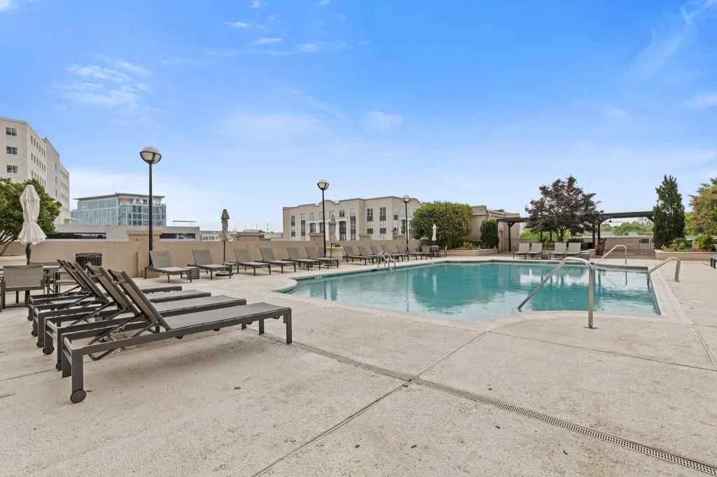 The amenities that come with this building are the best!  Pool, tennis, pickle ball, gym, gathering area, games, bbq area....  and the location can't be beat!