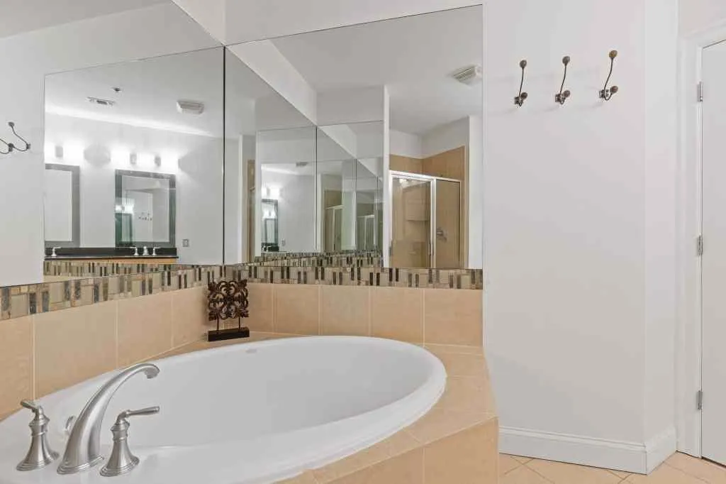 The Primary en suite bath has a seperate tub and shower, double vanity. The closet features a custom closet system.