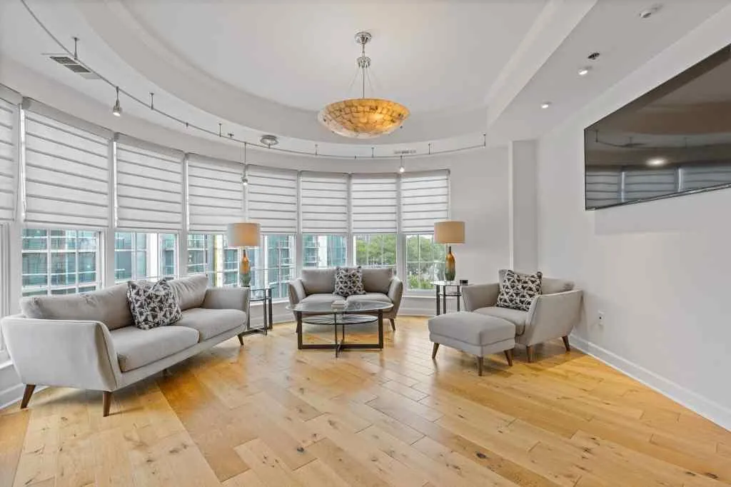 This living space is the perfect city living space.  The wall of windows is the perfect accent to this room.