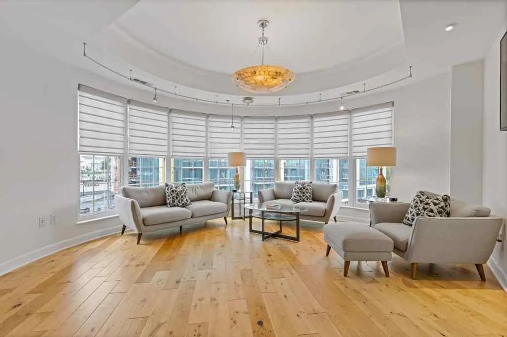 This living space is the perfect city living space.  The wall of windows is the perfect accent to this room.