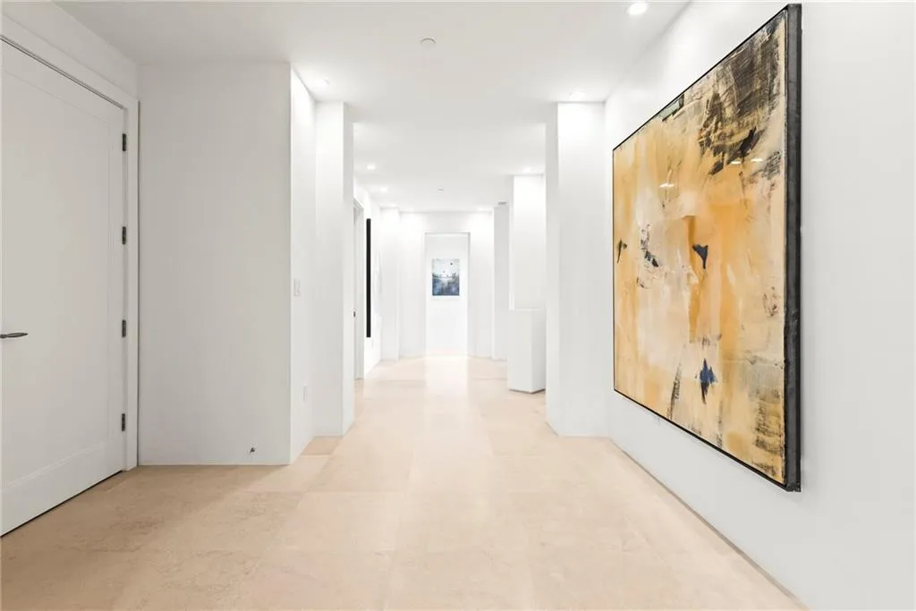 Lots of art walls so entry doubles as art gallery
