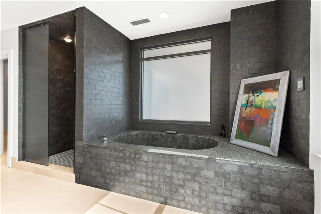 Very modern & very chic - frosted window provides privacy from balcony