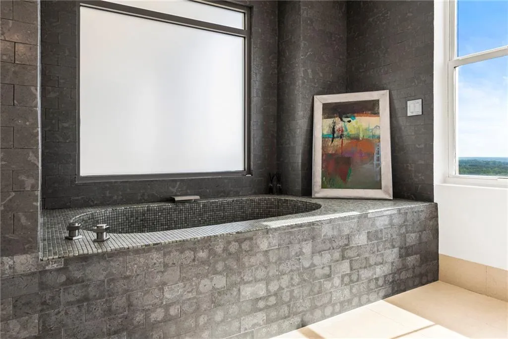 Tiled tub and contemporary fixtures