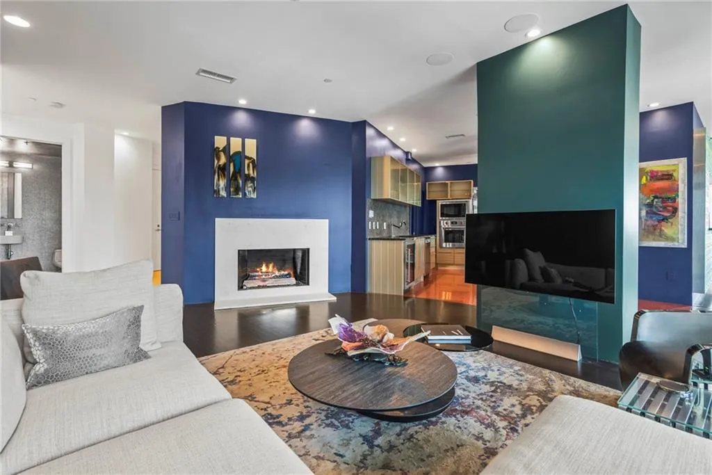 Contemporary Den off the Entry Foyer, kitchen looking into the powder room