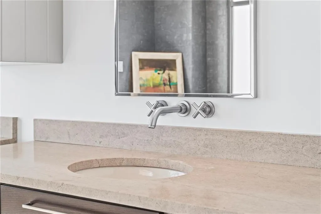 Contemporary faucets from the wall & stone counter tops!