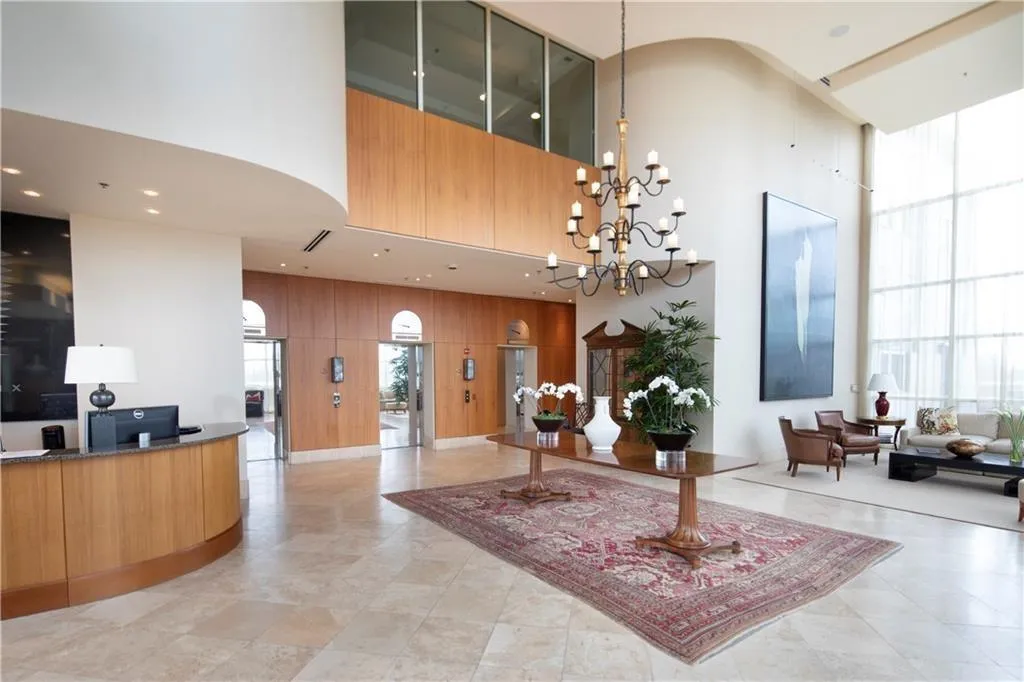 2 passenger and 1 freight elevator serves 65 condos