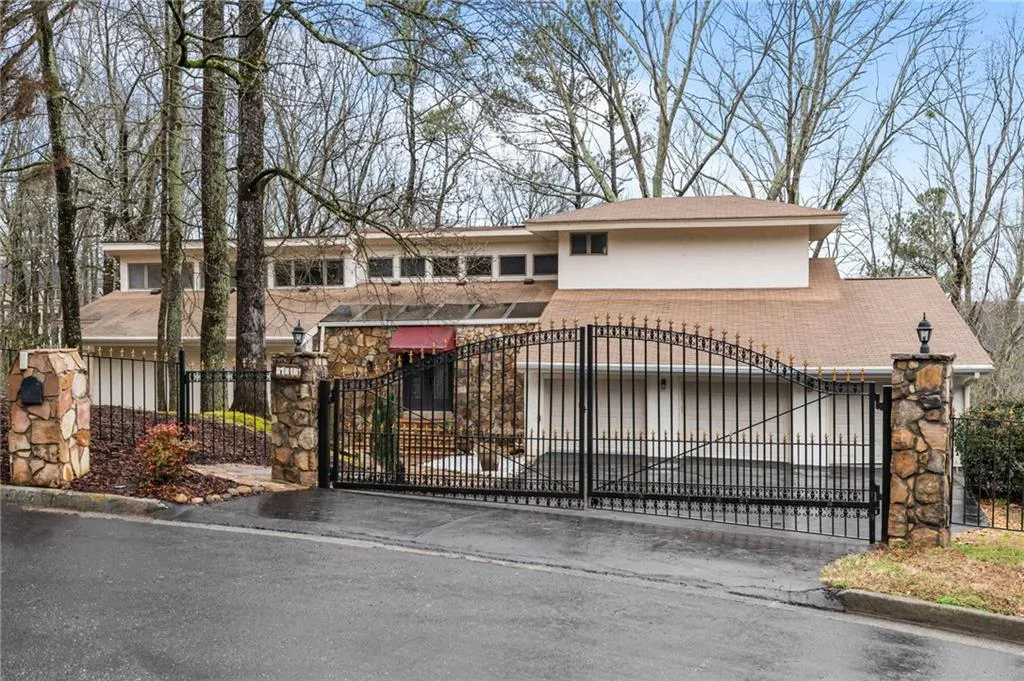 View of gate featuring a garage