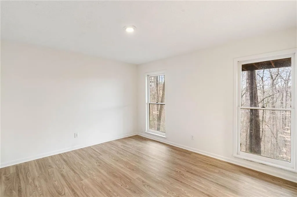 Spare room with light wood-type flooring