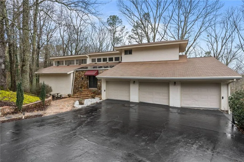 View of front of property with a garage