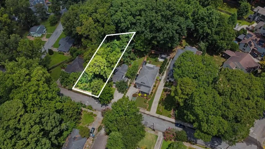 Build your dream home or next investment in the heart of Kirkwood on this wooded, R-4 Zoned Lot