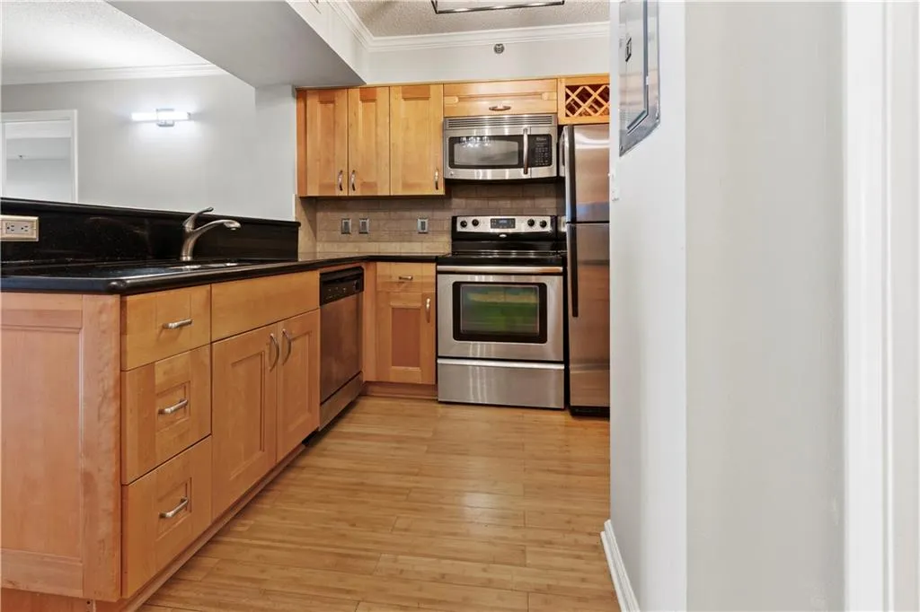 Chef's kitchen with bamboo flooring throughout