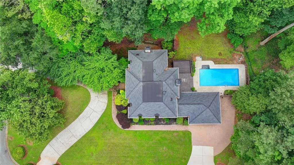 View from above of property with a pool area