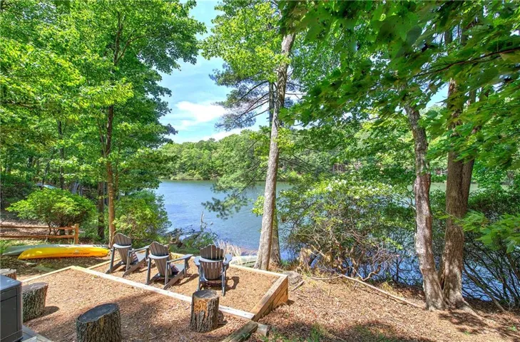12 Tamarack Point sits on Lake Tamarack in Bent Tree, a gated, golfing community in the North Georgia mountains.